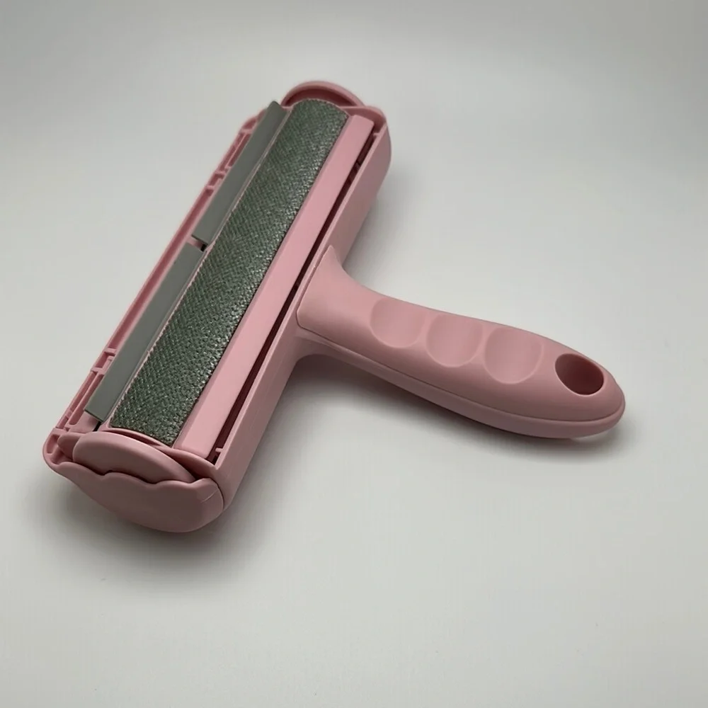 Pink and Silver Dog Grooming Tool